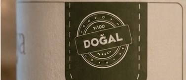 DOĞAL stamp on the olive tab