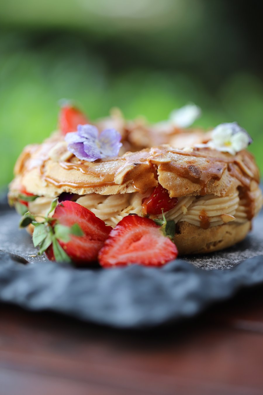 Paris-Brest with strawberries and edible flowers